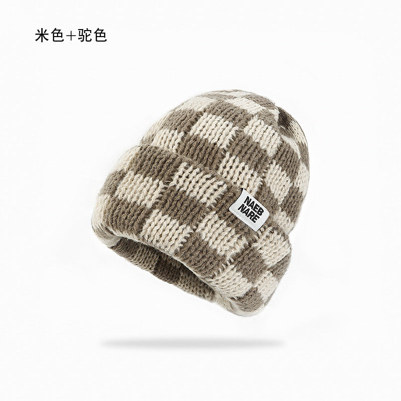 Wholesale Checkerboard plaid knitted hat women' s autumn and winter face-revealing small warm hat
